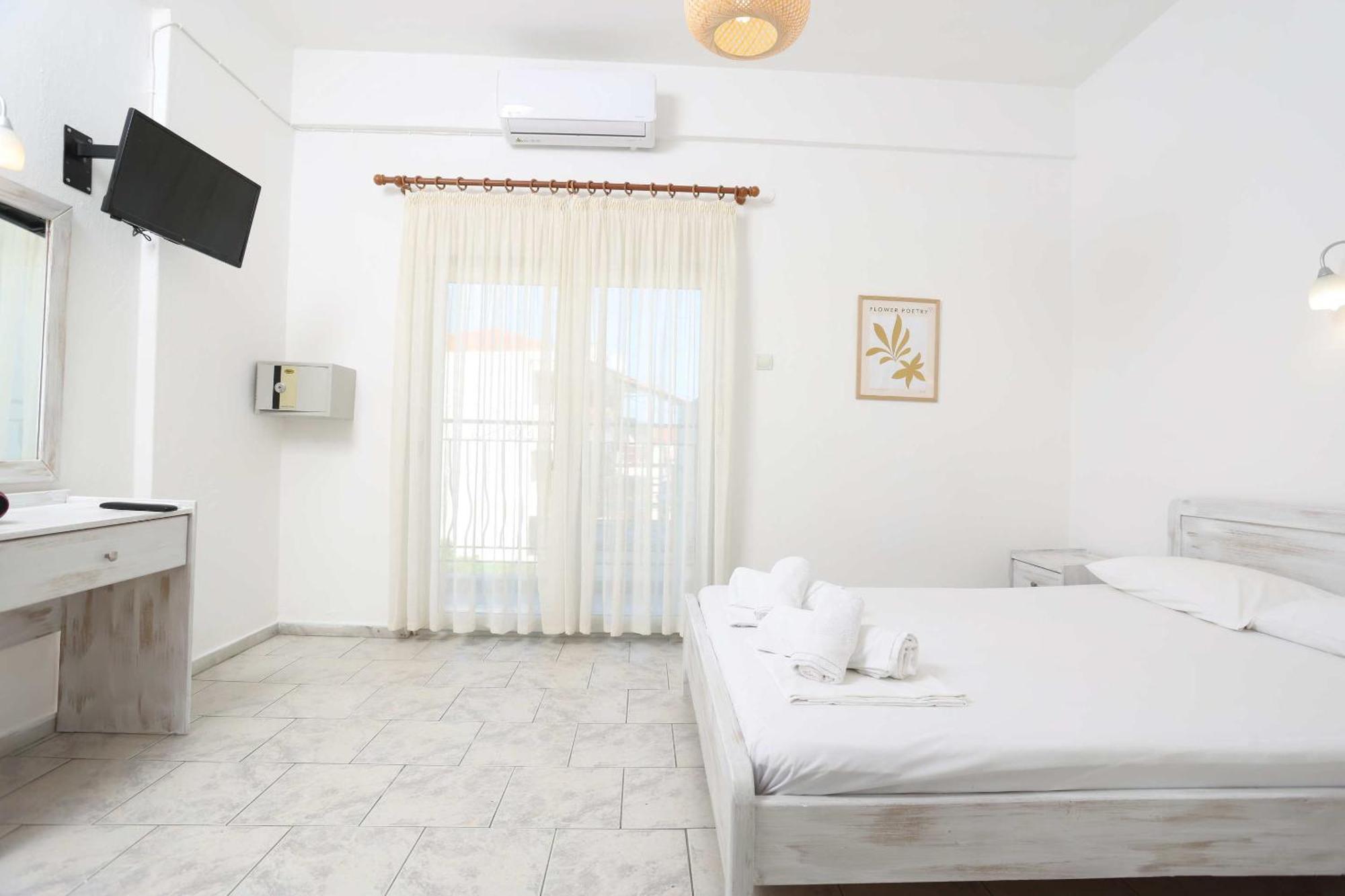 Spanos Apartments Anna'S Lodge Polychrono Esterno foto